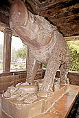 Khajuraho - the Varaha temple in front of the Lakshmana temple devoted to Vishnu in the form of the wild boar with graven representation of the god 